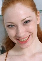 Millena allows us to watch as she takes a shower in her bikini, Millena (mil016) ATK Archives: Millena (Millena allows us to watch as she takes a shower in her bikini)