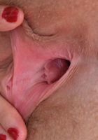 Nickey grabs her pink lips and spreads., Nickey Huntsman (nic093) ATK Natural & Hairy: Nickey Huntsman (Nickey grabs her pink lips and spreads.)